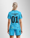 Woman Wearing Raglan Soccer Jersey and Shorts Mockup