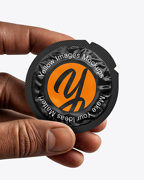 Matte Condom Packaging in a Hand Mockup
