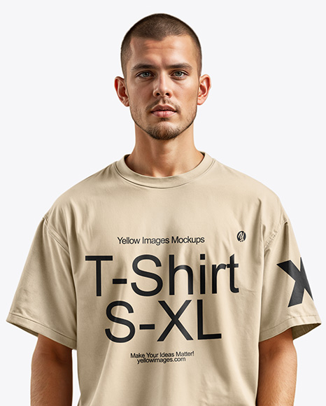 Man Wearing an Oversize T-shirt and Pants Mockup