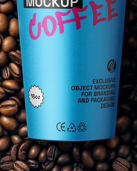16oz Paper Cup on a Stack of Coffee Beans Mockup