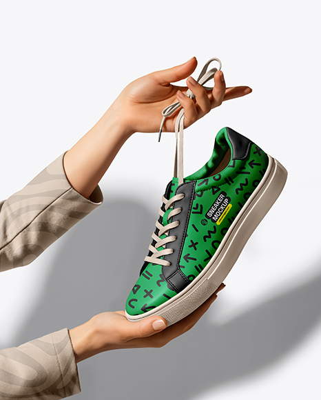 Woman's Hands Holding Sneaker Mockup