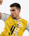 Man Wearing Soccer Jersey and Shorts Mockup