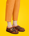 Pair of UGG Slippers on Woman's Legs Mockup