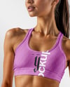 Woman Wearing Sports Bra and Sweatpants Mockup