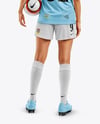 Female Soccer Player Wearing Jersey and Shorts Mockup