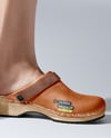 Pair of Clogs on Woman's Legs Mockup