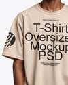 Black Man Wearing Oversized T-Shirt and Baseball Cap Mockup