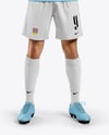 Man Wearing Soccer Jersey and Shorts Mockup