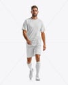 Soccer Player Wearing Raglan Jersey and Shorts Mockup