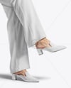 Pair of Suede Mules on Woman's Legs Mockup