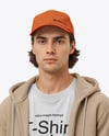 Young Man Wearing Hoodie and Holding Skateboard Mockup
