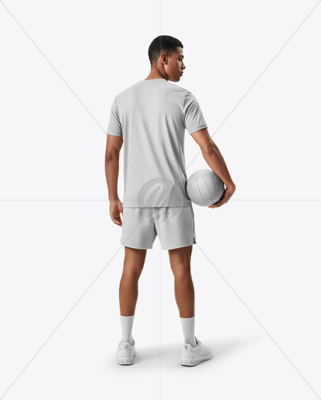 Man Wearing Full Volleyball Kit with Ball Mockup