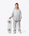Girl Wearing Hoodie & Cargo Pants with Skateboard Mockup
