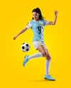 Woman Wearing Soccer Jersey and Shorts Mockup