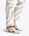 Pair of Suede Mules on Woman's Legs Mockup
