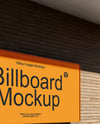 Outdoor Billboard on Wooden Wall Mockup