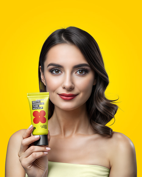 Woman Holding Matte Cosmetic Tube in a Hand Mockup