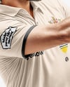 Man Wearing Full Cricket Kit with Bat Mockup