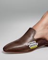 Pair of Leather Mules on Woman's Legs Mockup