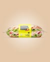 Clear Plastic Flow-Pack with Sandwich in Paper Sleeve Mockup