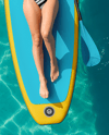 Woman Wearing Bikini Lying on SUP Board Mockup