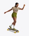 Black Woman Wearing T-Shirt and Shorts Standing on Longboard Mockup
