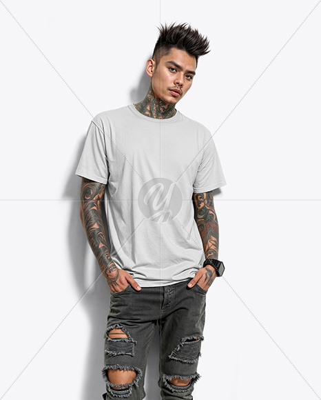 Young Man with Tattoo Wearing T-shirt and Ripped Jeans Mockup