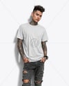 Young Man with Tattoo Wearing T-shirt and Ripped Jeans Mockup