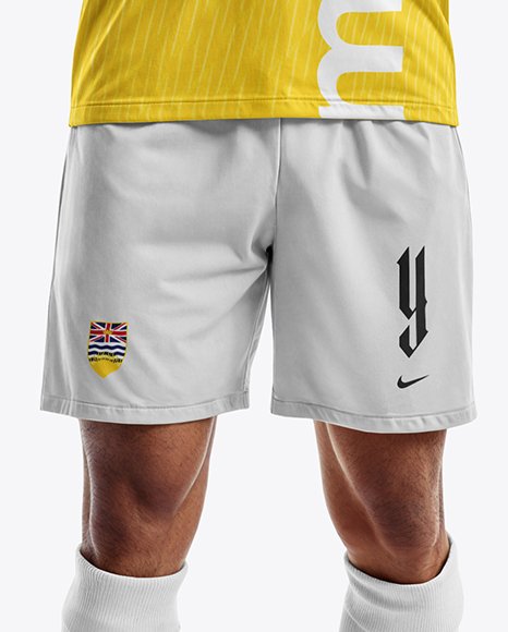 Smiling Man Wearing a Full Soccer Kit Mockup