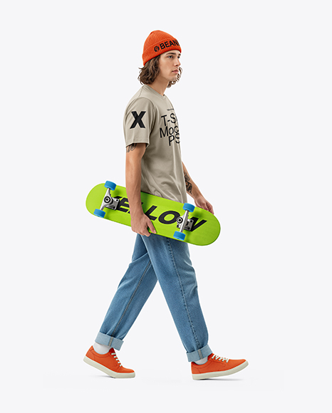 Young Man Wearing T-Shirt and Beanie Hat Holding Skateboard Mockup
