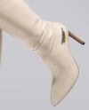 Pair of High-Knee Boots on Women's Legs with Dress Mockup
