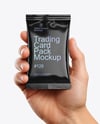 Glossy Trading Card Pack in a Hand Mockup