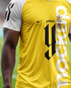 Soccer Player Wearing a Crew Neck Jersey and Shorts at the Stadium Mockup