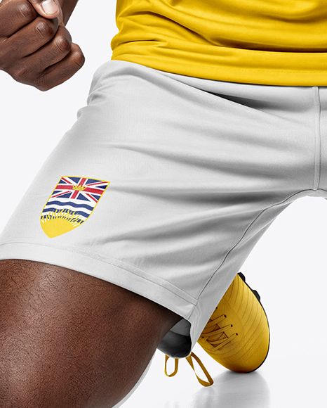Afro-American Man Wearing Raglan Soccer Jersey and Shorts Mockup