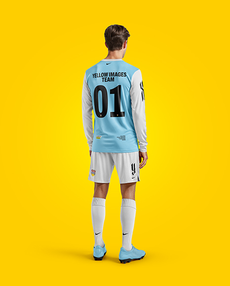 Man Wearing Long Sleeve Soccer Jersey and Shorts Mockup
