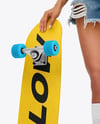 Woman Wearing Sleeveless Shirt and Jean Shorts with Skateboard Mockup