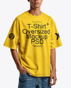 Man Wearing Oversized T-Shirt and Sun Visor Mockup