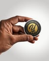 Round Sticker in a Hand Mockup