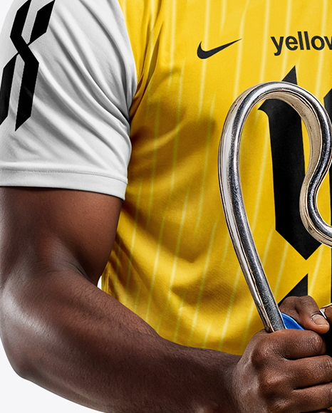 Soccer Player Wearing Jersey and Shorts Holds Cup Mockup