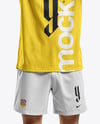 Man Wearing Crew Neck Soccer Jersey and Shorts Mockup