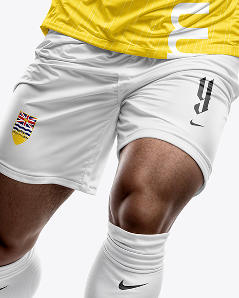 Soccer Player Wearing a Full Kit Mockup