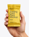 Glossy Trading Card Pack in a Hand Mockup