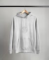 Hoodie on a Wooden Hanger Against a Plain Background Mockup