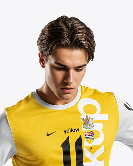 Soccer Player Wearing Crew Neck Jersey and Shorts Mockup
