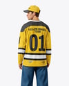 Man Wearing Ice Hockey Jersey Mockup - Back View