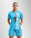 Woman Wearing Soccer V-Neck Jersey and Shorts Mockup