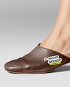 Pair of Mules on Woman's Legs Mockup