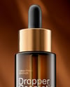 Amber Dropper Bottle on the Rock Mockup