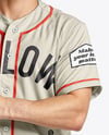 Baseball Player Wearing a Jersey and Helmet with a Bat Mockup