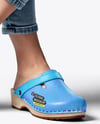 Pair of Clogs on Woman's Legs with Jeans Mockup